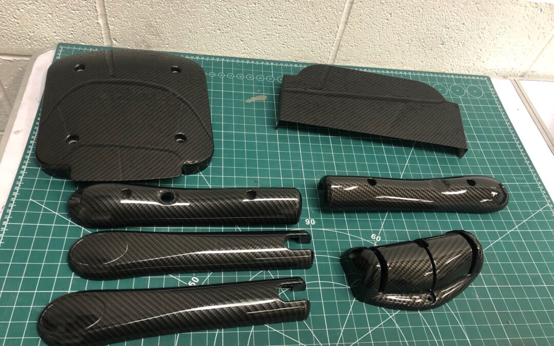 Chairlift panels hydro dipped in carbon fibre