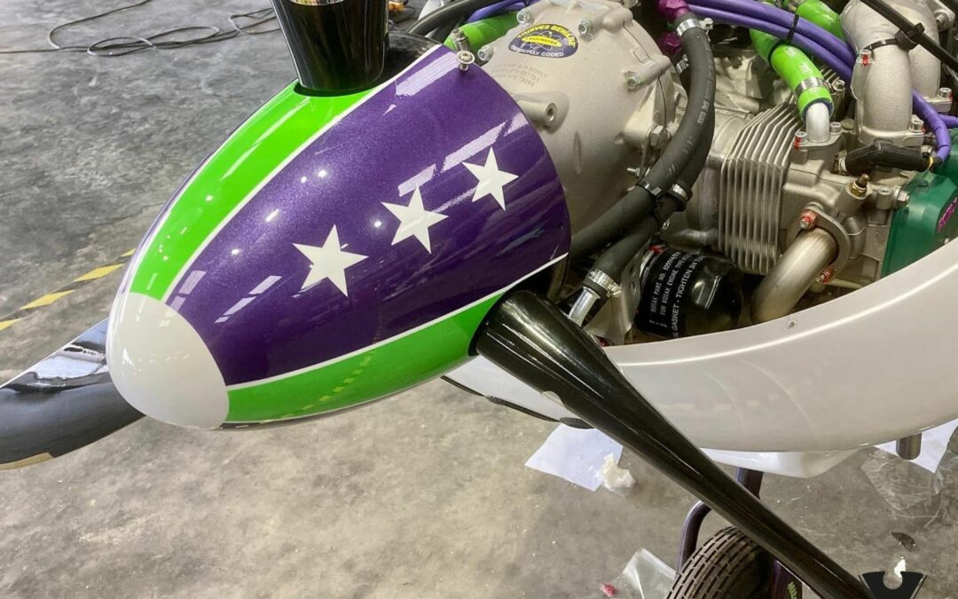 Cessna nose cone custom painted in purple, green and white with stars