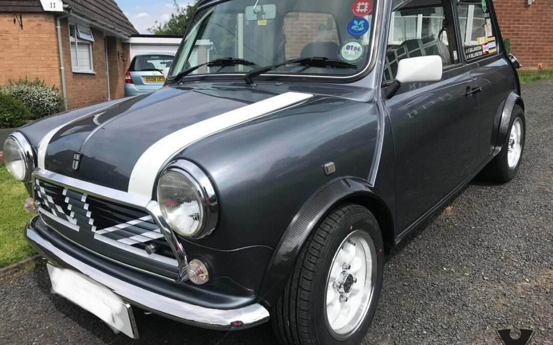 Mini Cooper with hydro dipped carbon fibre engine plastics and wheel arches