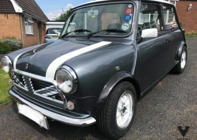 Mini Cooper with hydro dipped carbon fibre engine plastics and wheel arches