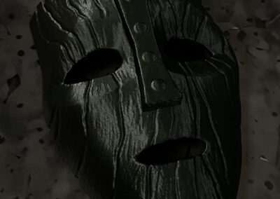 3D Printed Mask Painted in Satin Black, low light front view