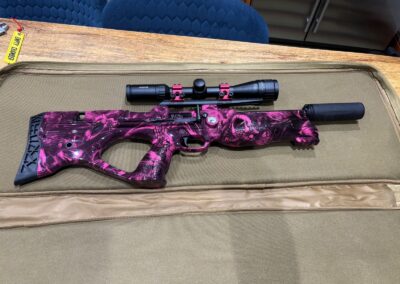 Air Rifle Stock Hydro Dipped in Pink Venom, rifle with scope