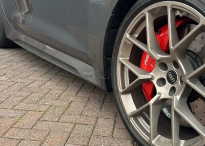 Audi RS5 Hybrid side profile showing the red painted brake calipers