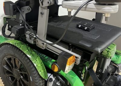 Dietz Powerchair Hydro Dipped in Green Hex Carbon, front caster and arch cover detail
