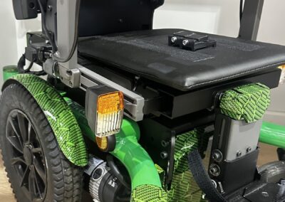 Dietz Powerchair Hydro Dipped in Green Hex Carbon, side view with hex carbon wheel arch
