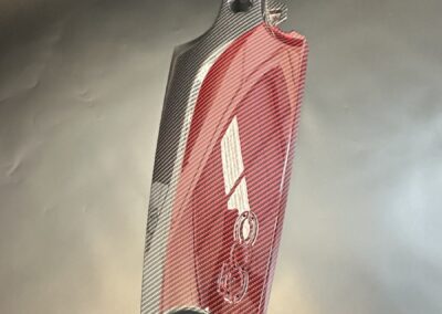 Overhead view of a red and black carbon Fiat 500 dash trim