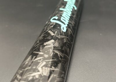 Barrel and logo of a forged carbon hydro dipped baseball bat