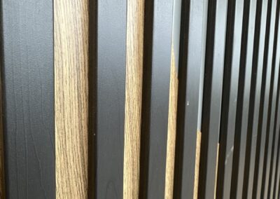 Close-up of hydro dipped wood grain slats at Fulham Pier