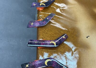 Small mobility trim pieces in a galaxy finish with gold stars
