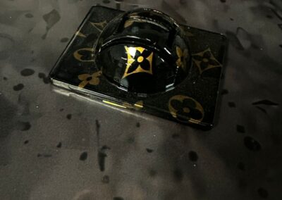 Golf Ball Line Markers Designed, 3D Printed and Hydro Dipped, black and gold marker close-up