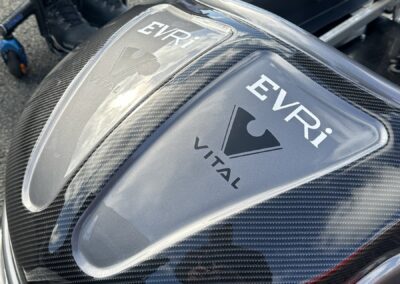 Golf Powerchair Finished in Carbon Fibre and Anthracite with Custom Logos, front nose close-up