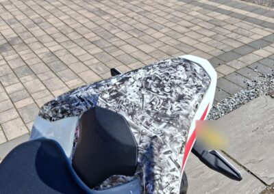 Kawasaki Z900 Hugger Hydro Dipped in Lined Carbon and Seat Cowl in Lest We Forget, Lest We Forget seat cowl close-up