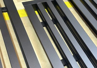 Linear Air Vent Grilles Painted in Dark Brass