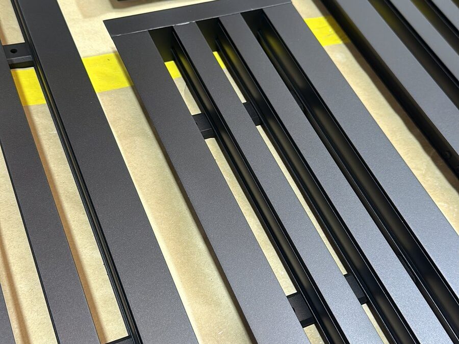 Linear Air Vent Grilles Painted in Dark Brass