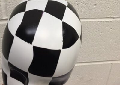Mannequin Light Stand Custom Painted in a Chequered Flag Design, chequered head close-up