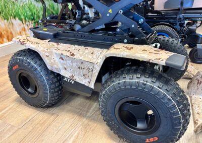 Desert digital camo side panels on an off-road powerchair