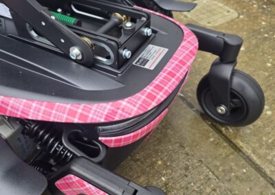 Powerchair Hydro Dipped in a Custom Pink Tartan Film, base shroud detail
