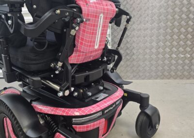 Powerchair Hydro Dipped in a Custom Pink Tartan Film, seat back cover