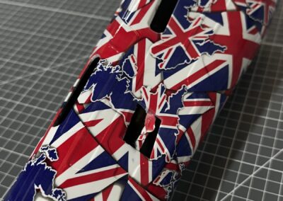 Prosthetic Leg Cover Hydro Dipped in Union Jack, angled view with slots