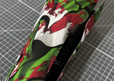Prosthetic Leg Cover Hydro Dipped in Welsh Flag, angled view