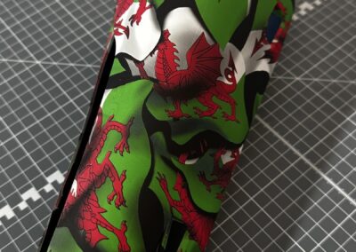 Prosthetic Leg Cover Hydro Dipped in Welsh Flag, front view