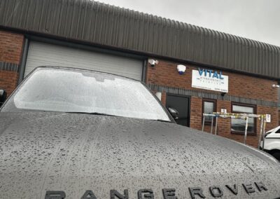 Range Rover Satin Wrap with Gloss Black Painted Exterior and Carbon Interior, gloss black bonnet lettering