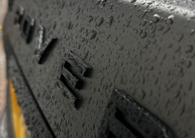 Range Rover Satin Wrap with Gloss Black Painted Exterior and Carbon Interior, gloss black tailgate lettering